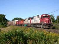 SOO 6024, SOO 6031, CP 8248, StL&H 8223, StL&H 8216 lead an eastbound down the escarpment.