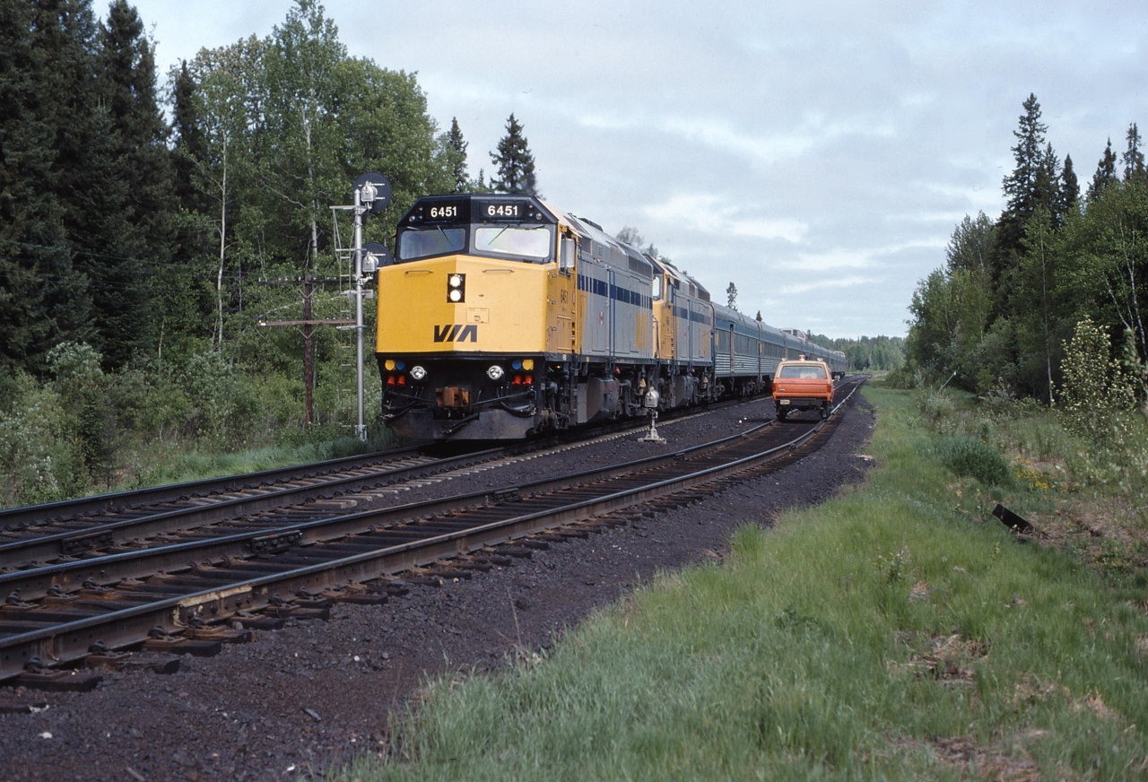 While hi-railing across Northern Ontario, we were put in the hole at Oatland for VIA #2, The Canadian.