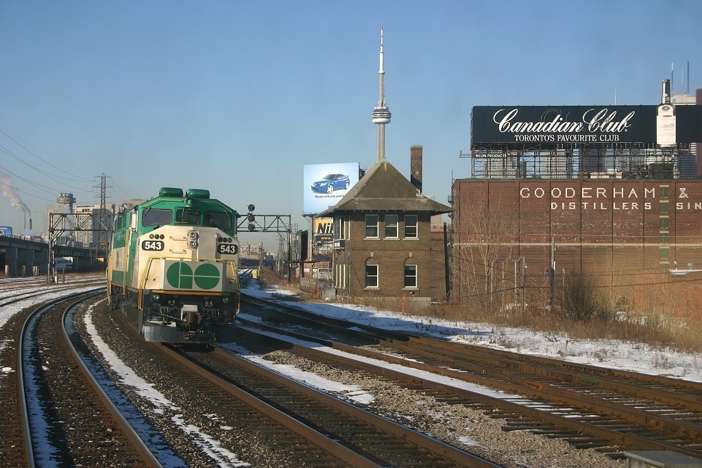 GO 543 shoves an inbound train past the Cherry Street tower, seen from an Oshawa bound GO train