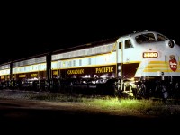 I used 16 #25B flashbulbs to light this consist - one bulb at a time! Cameras were set on bulb, then I fired a bulb, reloaded, walked a few feet, fired another bulb, etc. Conductor gave permission to shoot as long as the passengers were not bothered, and they were not. Taken on Kodachrome 64 film.