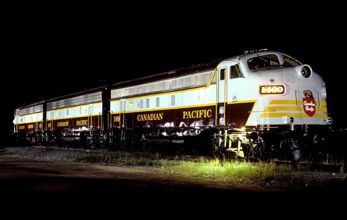 I used 16 #25B flashbulbs to light this consist - one bulb at a time! Cameras were set on bulb, then I fired a bulb, reloaded, walked a few feet, fired another bulb, etc. Conductor gave permission to shoot as long as the passengers were not bothered, and they were not. Taken on Kodachrome 64 film.