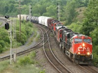 CN 148 comes off the hill with 6 units; CN 2332, CN 5736, CN 2401, IC 1020, CN 8921 and CN 5680