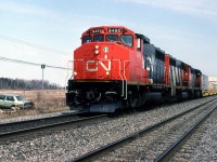 CN 133 coasts down the grade with the throttle partly shut before the coming curve.