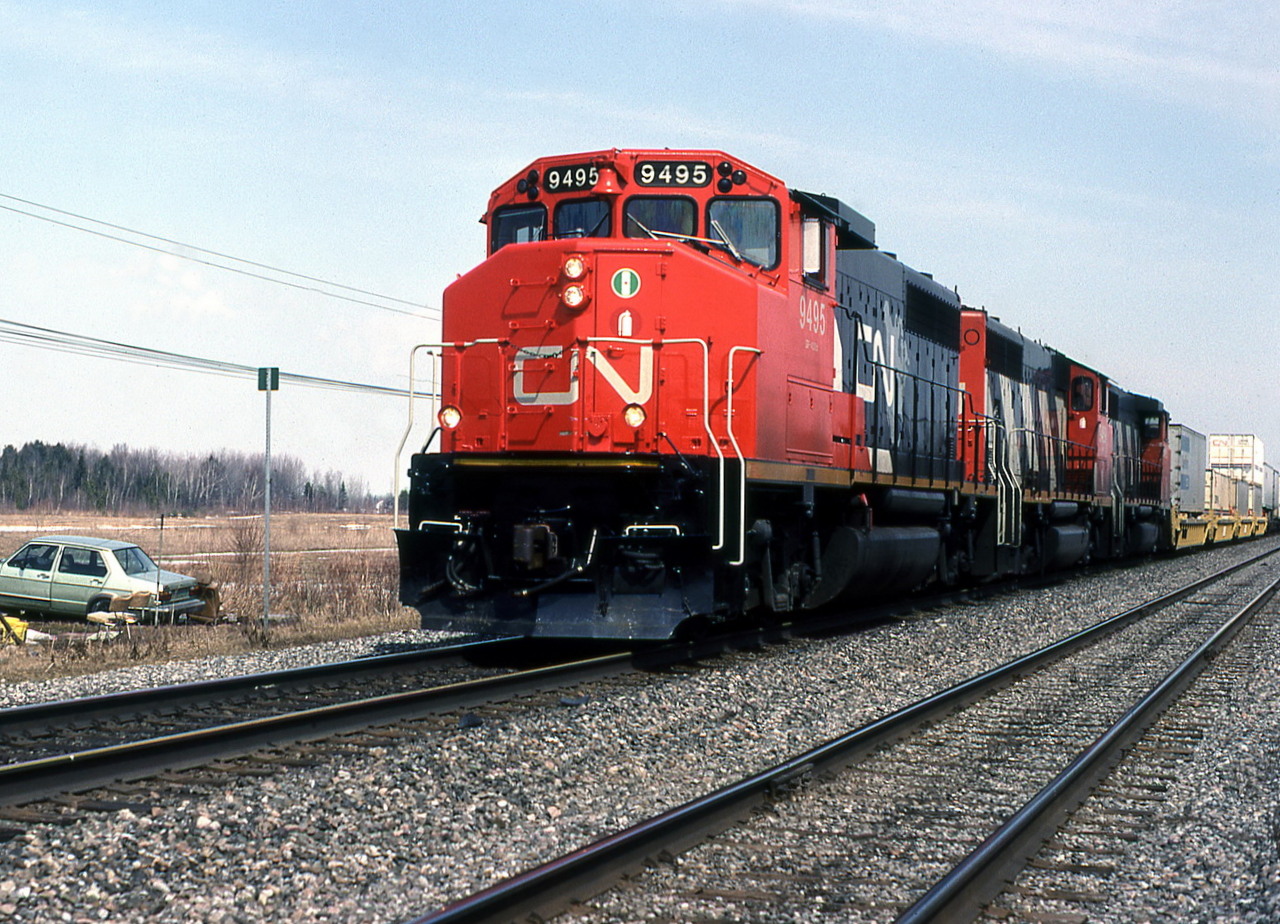 CN 133 coasts down the grade with the throttle partly shut before the coming curve.