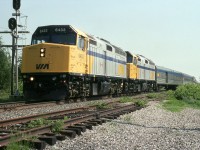 VIA 15 with 6433 and 6432 getting back on the main after a meet 10 miles west of Drummondville.
