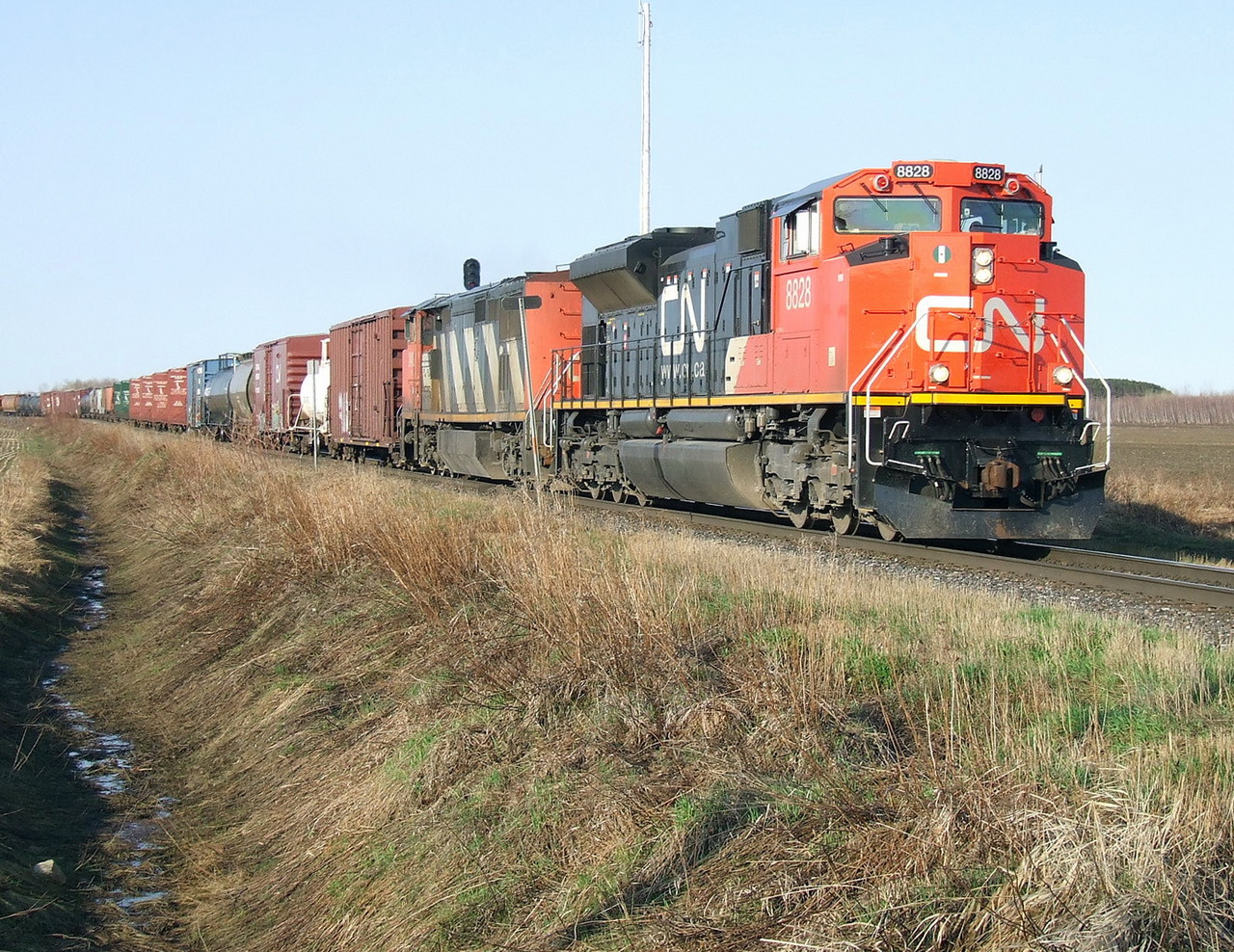 The late 122 that was abandonned since the 120 is in the 12000 ft long.This one has about 20 odd cars before its containers.
