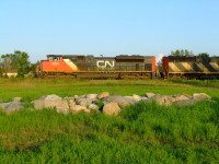 CN 400 crawls slowly on the siding to meet the very long 121.