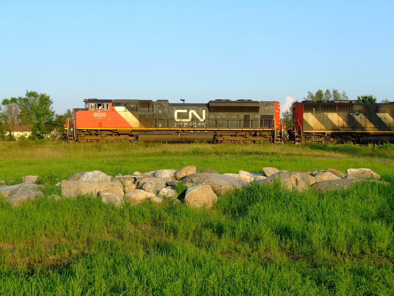 CN 400 crawls slowly on the siding to meet the very long 121.