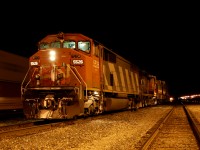 Eastbound CN 416 awaiting another train entering the yard to departure after that with, according myself, 2 very nice engine; CN SD60f #5526 and an CN SD40u #....