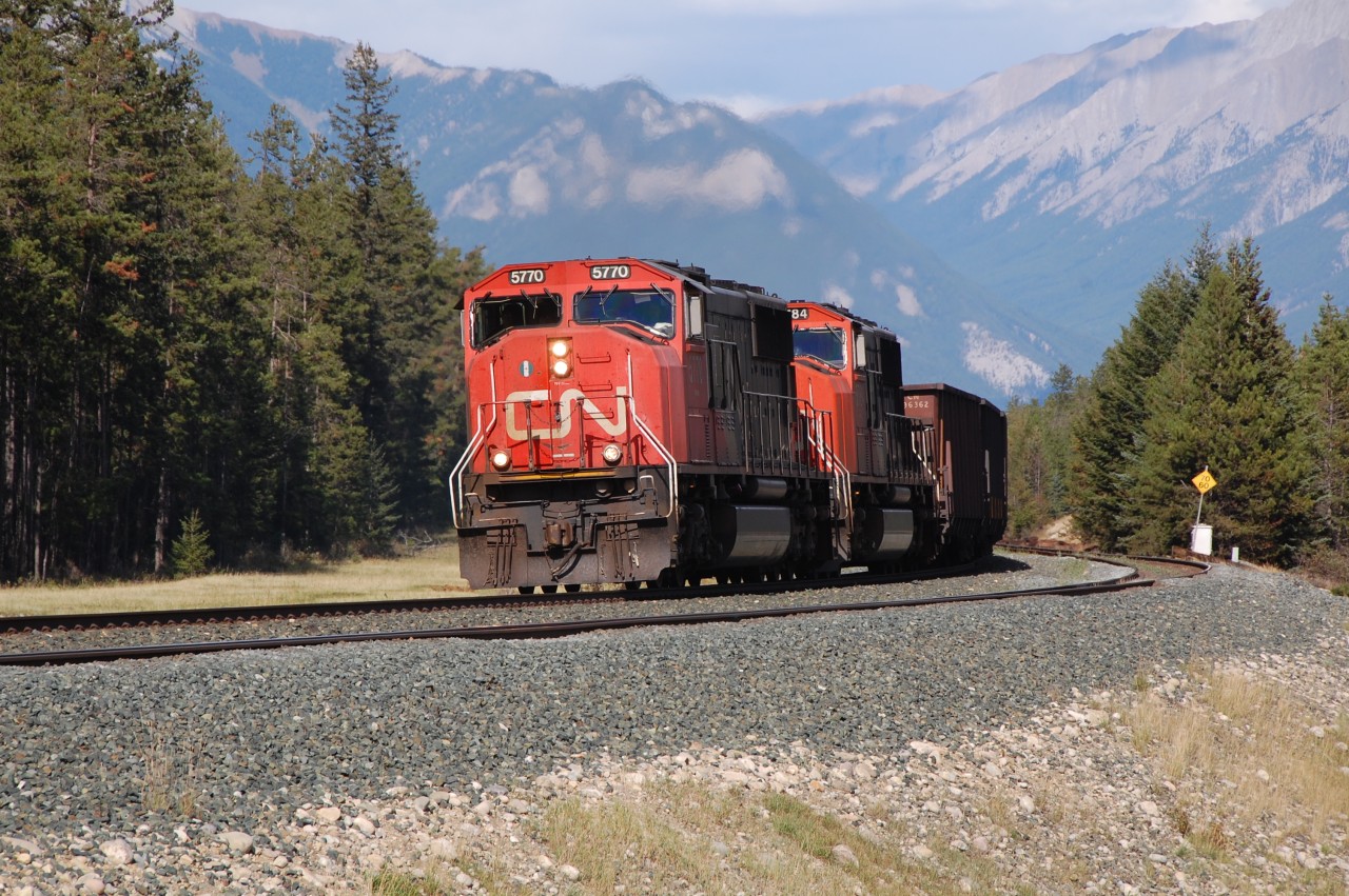 Working very hard, this CN coal train was going to Robert Bank BC, trailling by tow CN SD75I #5770 and 5784. Picture taking at CN English, about 4-5 miles east of Jasper AB.
