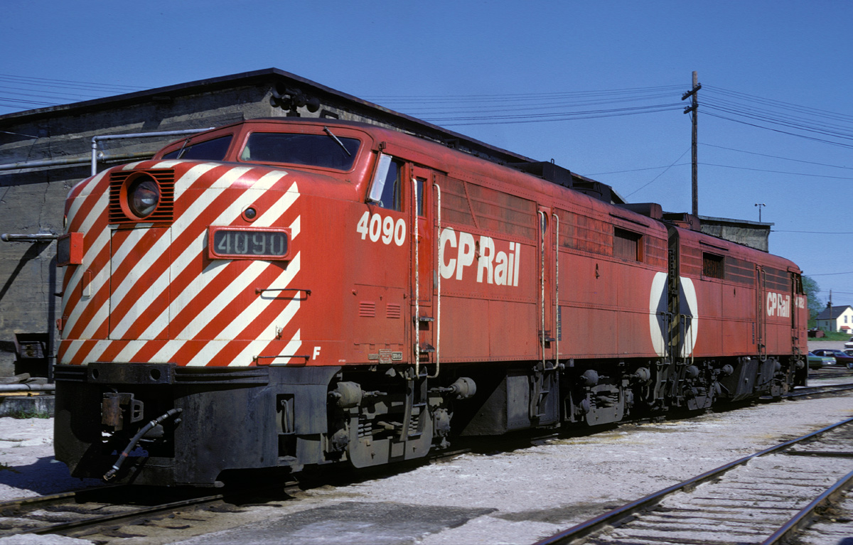 A set of FA-2's are laying over at the Sault roundhouse. And yes that is snow even though it is May!