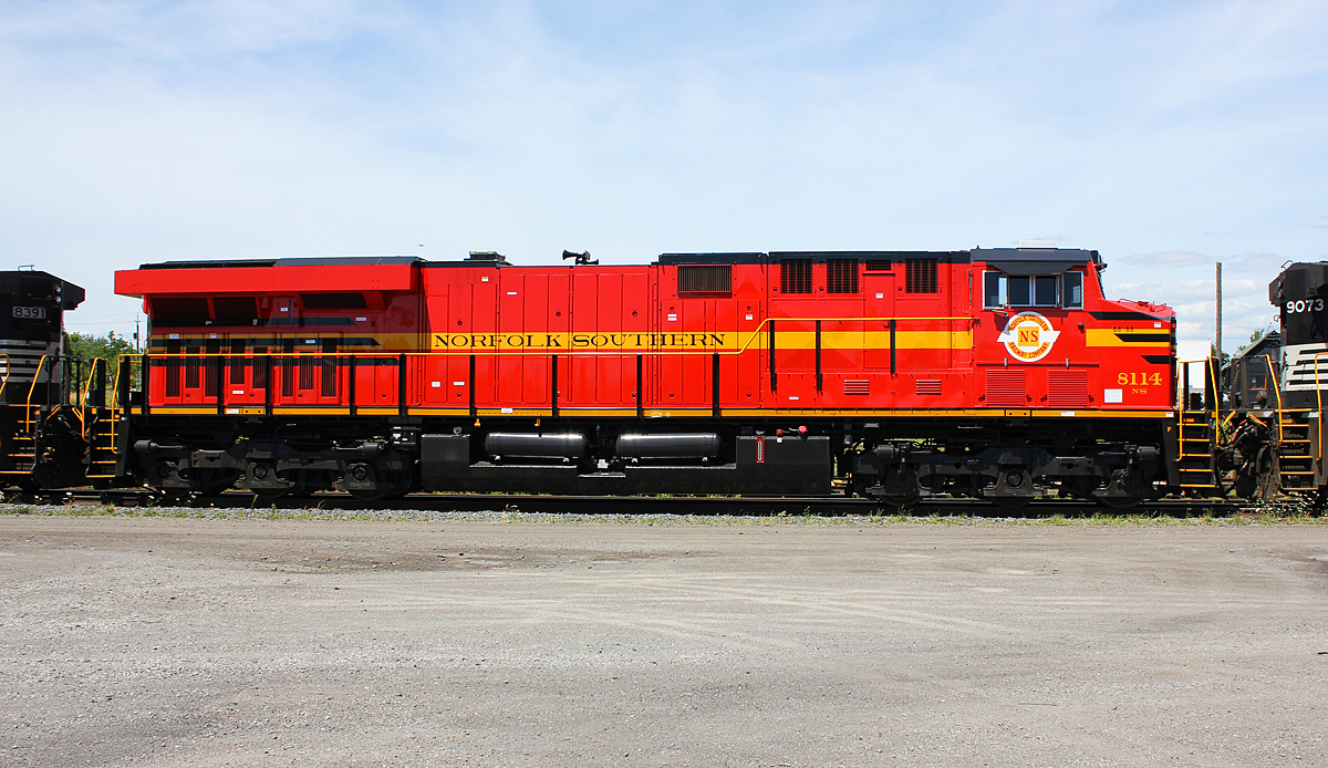 A close up roster shot of Norfolk Southern's 9th heritage unit, coupled between 2 older C40-9W's on the daily NS transfer to Ft. Erie, Canada