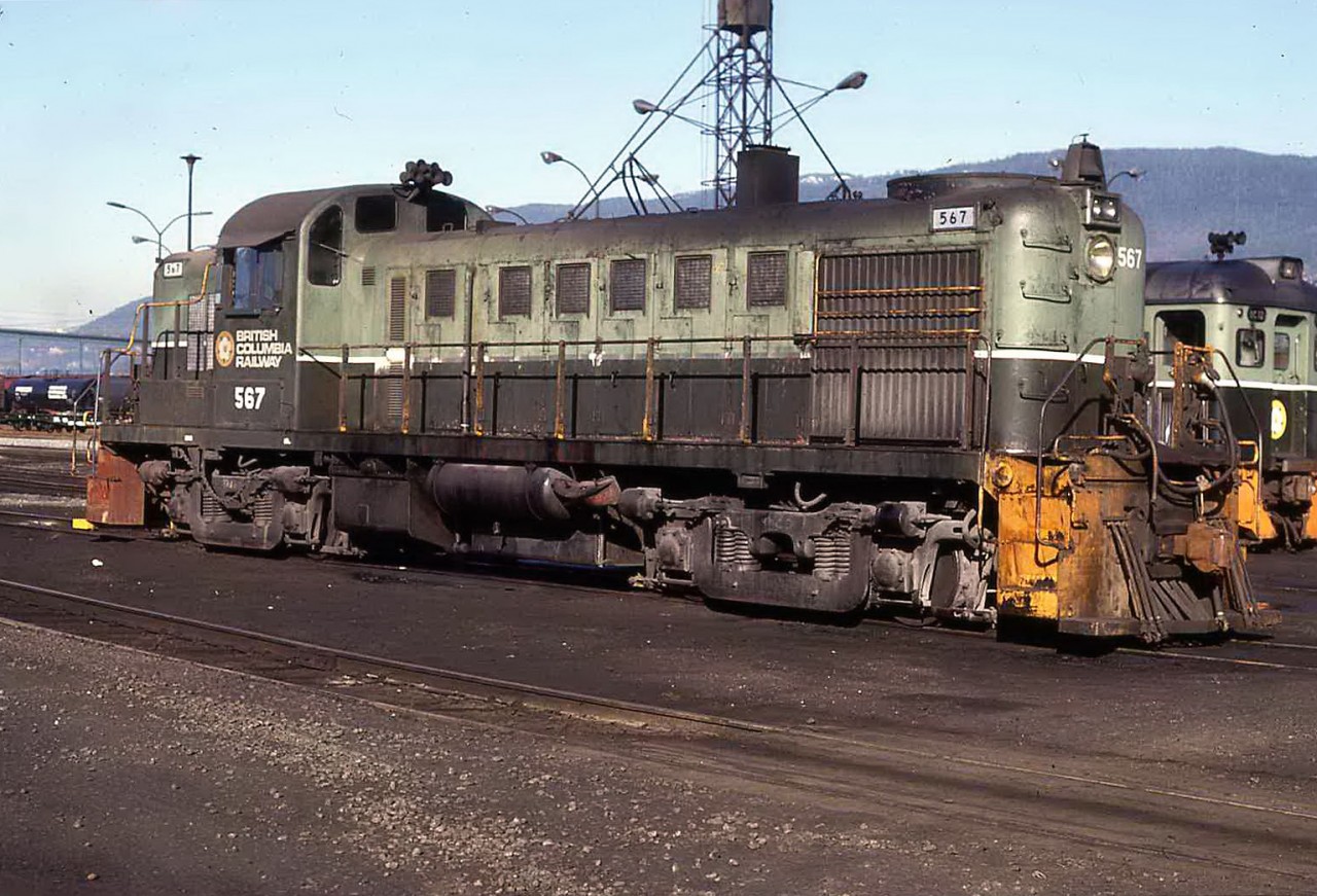 Some times I need to look back at my slides to recall what the olden days were really like..  BCR 567 idles away at the North Van shop area. Back then, the company was called the British Columbia Railway.