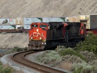 CN 8831 is in the process of crossing the Thompson River Bridge east of Ashcroft, BC