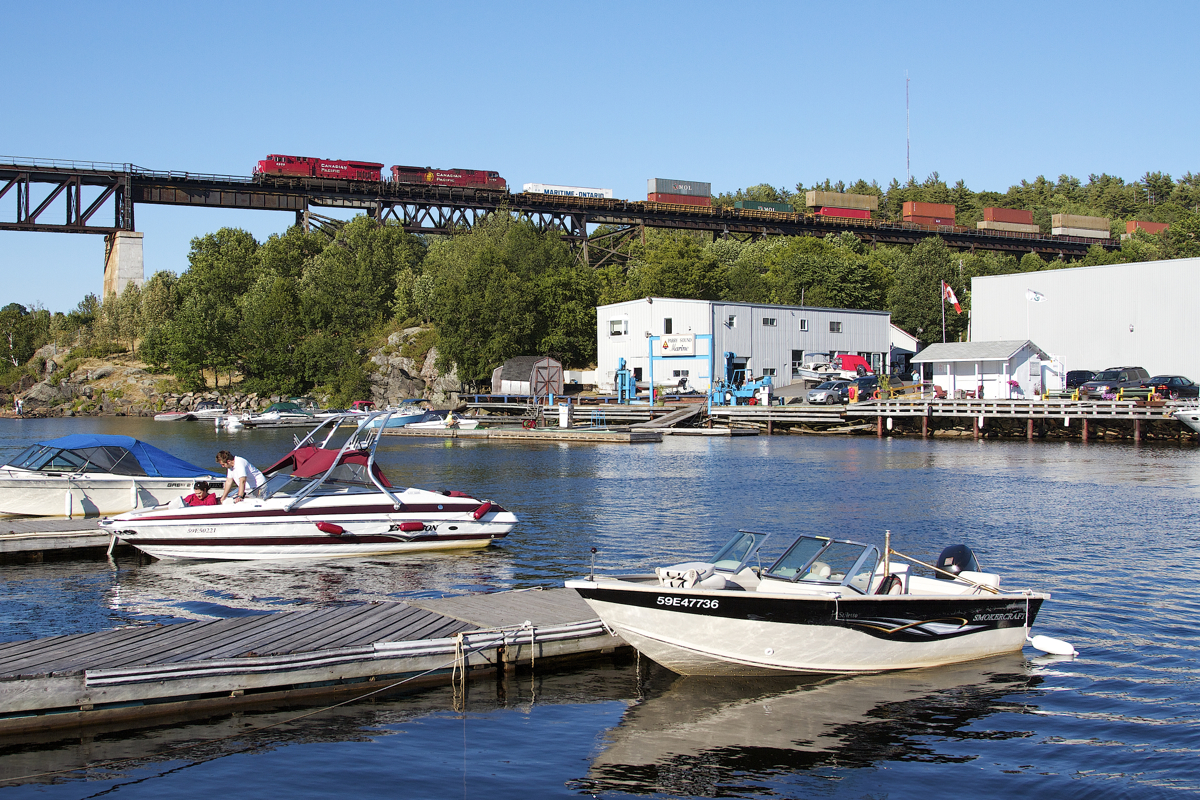 CP 119 flies over the Seguin River Trestle with northbound intermodal traffic on the Parry Sound subdivision.