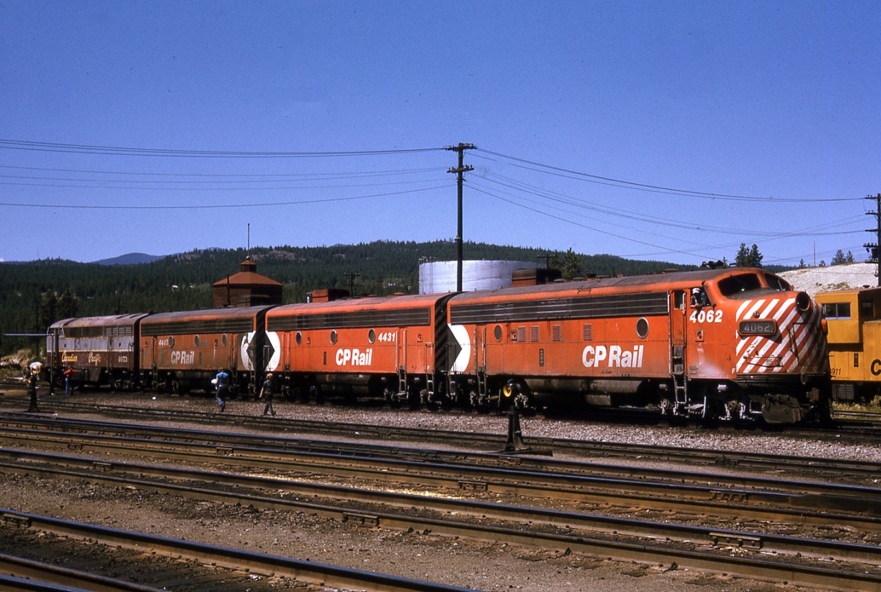 The sea of action red paint was reaching the far corners of the CP system when this consist was captured at Cranbrook, BC.  The bright red stands in contrast to the traditional colours of the C-Liner. 4062 would later be destroyed by fire while working in the east.