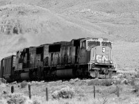 CN 5696 headed eastward through the parched landscape at Juniper Beach, British Columbia.