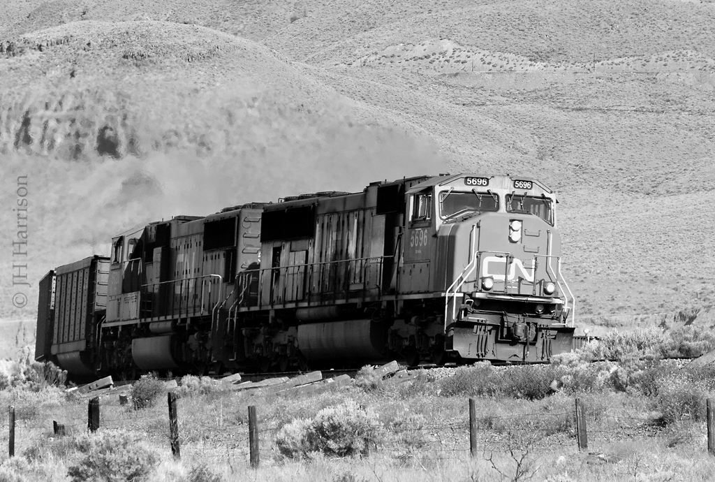 CN 5696 headed eastward through the parched landscape at Juniper Beach, British Columbia.