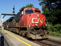 CN-2252 -ES-44-DC on south main track going to Halifax N.S on rte 120  behind loco ILLINOIS CENTRAL 1015 could not take a good picture