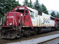 SOO Line 6026 EMD SD60 affiliated with Canadian Pacific owner was in Montreal harbor leading loco first time that I have see a SOO loco in harbor  photo loco on switch had to walk the loco did not come to open space was behind fence pass caméra in between fence 