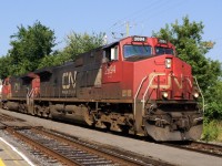 CN-2694 the leading loco for the gaz train coming from east end of Mtl.rafineries Ultramar going to Utramar plant in ST-Romuald near Québec had 67 thankers cars