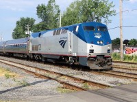 Amtrak 123 P-42-DC on rte 68 Adirondack going to New York  arriving to a crossing at Lemoyne St-Georges street just before Southwark yard