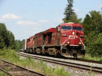CP 222 – CP 8705 South at Waubamik with 2 GE’s and 2 EMD’s on the head end of 98 cars.
