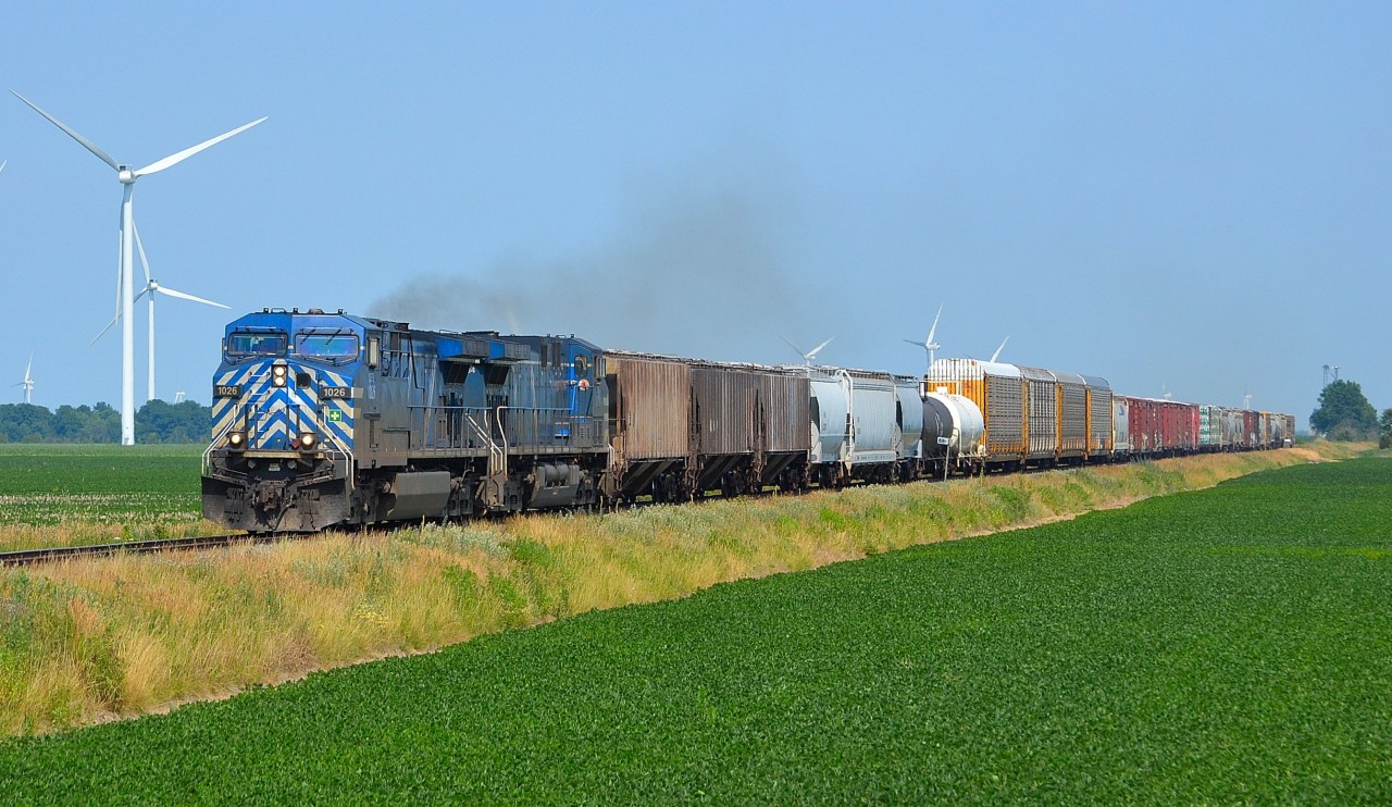 CP 441 led by a pair of CEFX leasers, heads westbound thru Haycroft on its way towards Windsor.