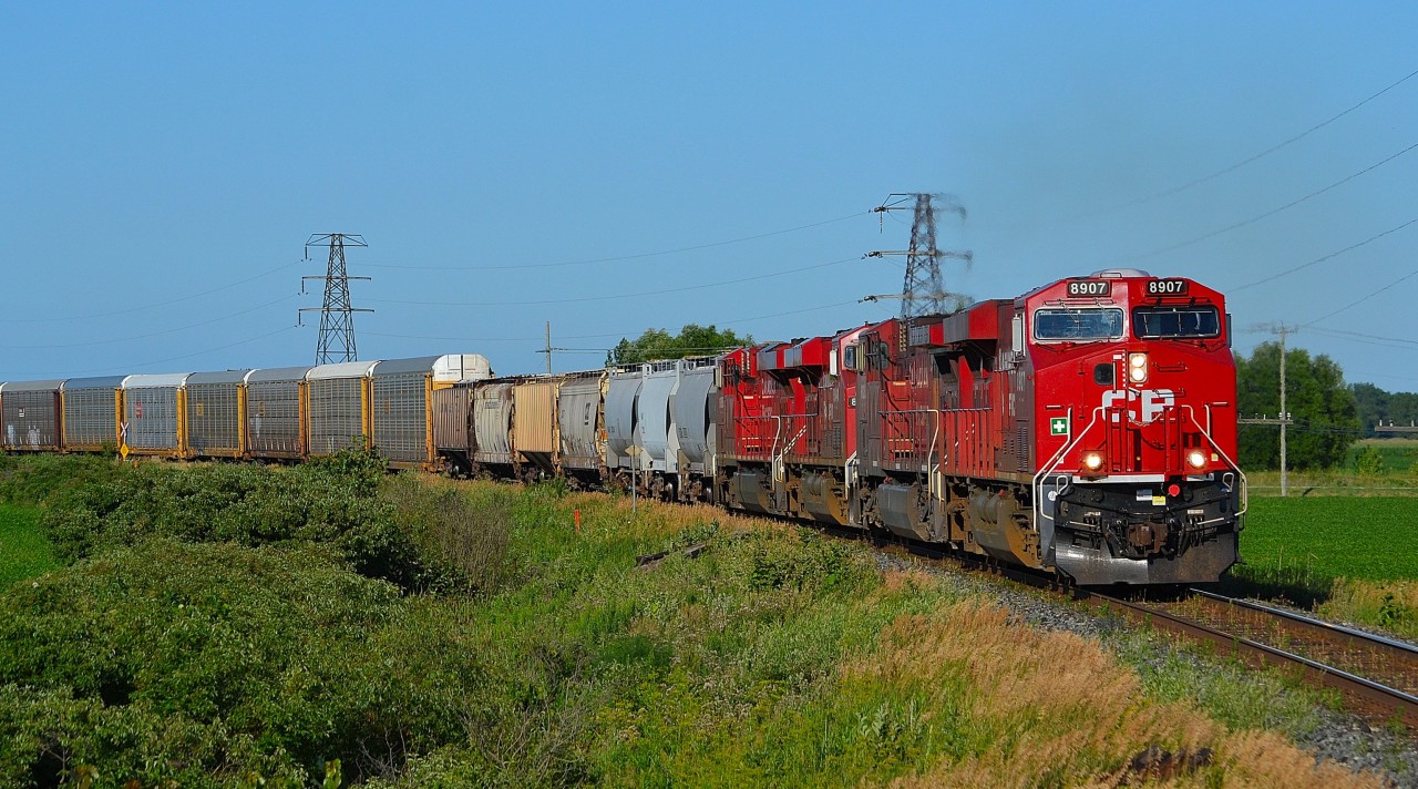 CP 8907 leads a quartet of GE's on CP 441 around the bend in Tilbury on its way into Windsor.