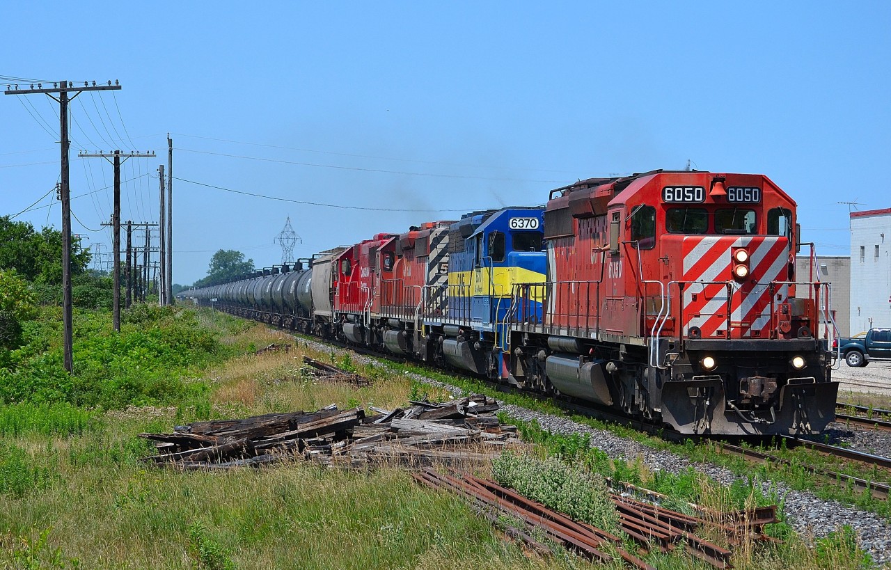 CP 640 charges thru Tilbury in the summer heat.