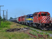 CP 640 charges thru Tilbury in the summer heat.