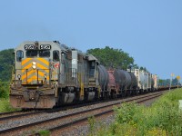CN 509 led by a pair of grey GTW SD40-3s, heads eastbound out of Sarnia on its way back to London