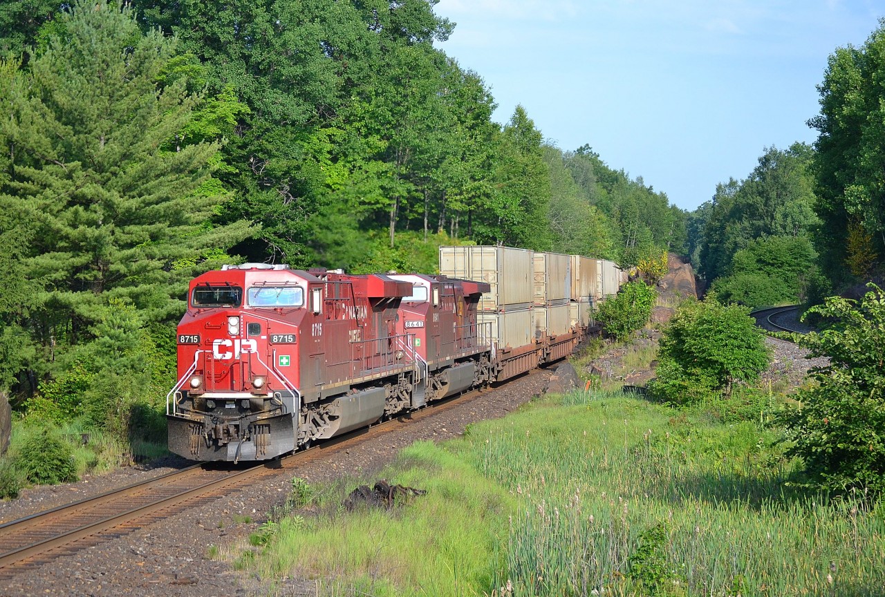 CP 112 with 8715 on the point approaches Rosseau Road
