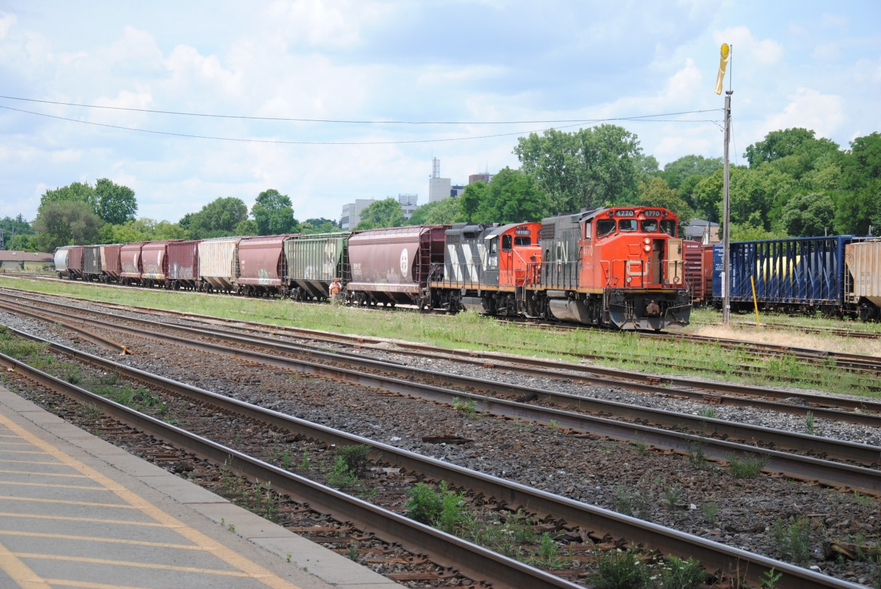 The Marshling Yard train of brantford is working in the station dropping off all it's cars. Notice that all it's cars are Hoppers.