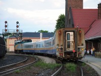 As a VIA Rail train makes it's stop into Brantford going eastbound to Toronto in between the tracks its on behind it and take a quick picture of this VIA Rail