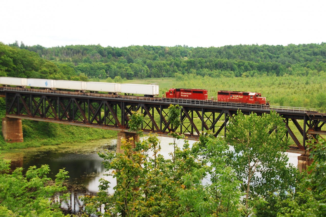 CP Expressway #121 with 5857 & 5879 on Mud Lake Trestle mp 27.5 Belleville Sub
