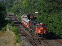 CN 2317 leads train #148 through Bayview with 2 business cars and some manifest freight on the head end. 