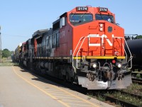 CN 382 cruises through Brantford with a lengthy train.  CN 2174 is leading, it was once ATSF 825.  