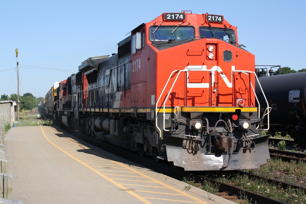 CN 382 cruises through Brantford with a lengthy train.  CN 2174 is leading, it was once ATSF 825.