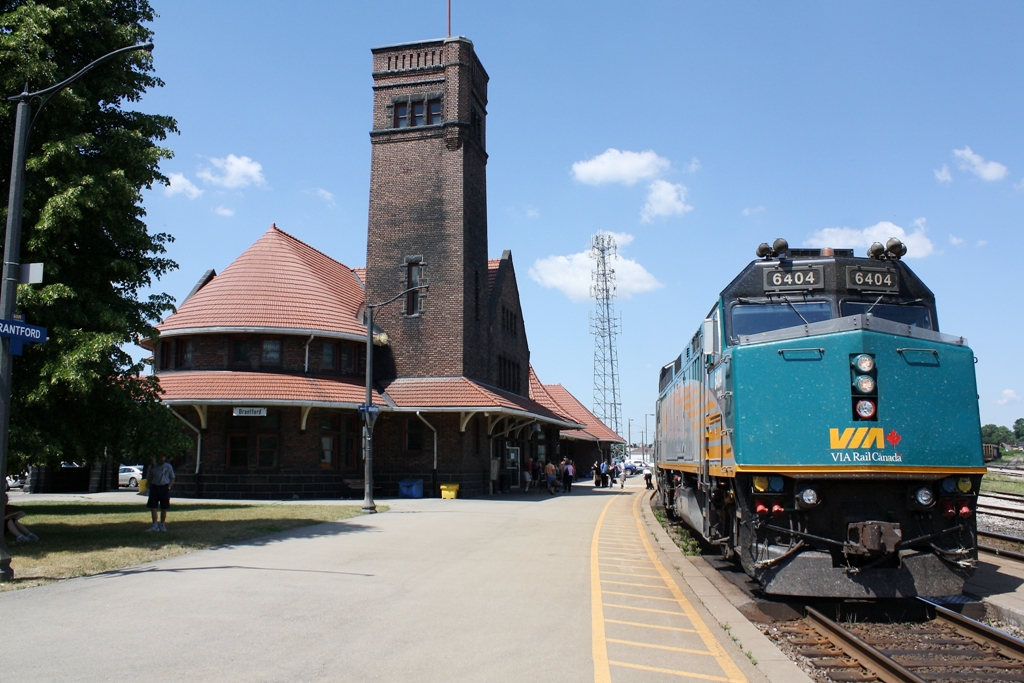Via 6404 with train number 72 has stopped alongside the Brantford Via Station.  I enjoy using the station as a background for images.  It is typically easier to get a shot of it with a train beside it when the train has stopped.