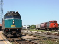 Via 6454 and CN 4770 momentarily meet by the Brantford Yard.  The trains are CN 580 and Via 72.