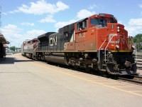 CN 8962 leads CN 332 through Brantford at 1 o'clock sharp.  The trailing unit was BCOL 4625.  It had been quite a while since I had seen one of the BC Rail Dash 8's.