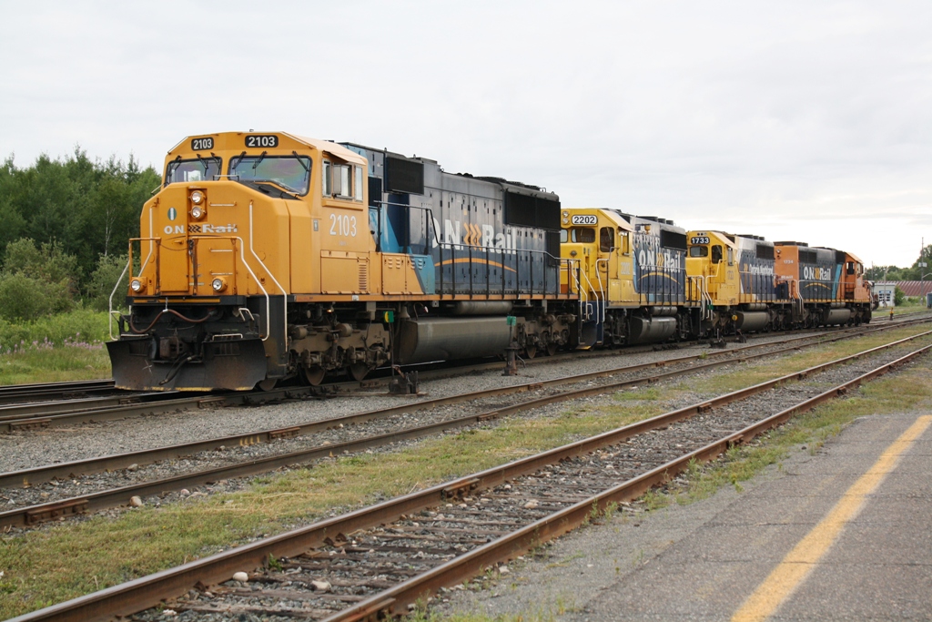 ONT 2103 leads four other units through the yard at Englehart Ontario on the Temagami Subdivision.  This is the largest lashup of motive power I saw all week.