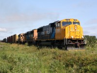 ONR 2102 has been back in service for about a week now and it is seen here leading a southbound freight back to North Bay Ontario.  I am standing on Kerr's road just outside of Englehart.