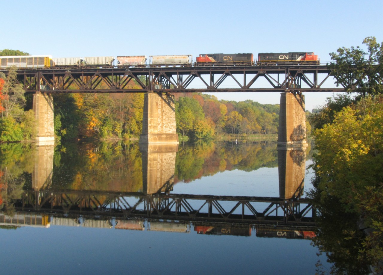 An Eastbound C.N. freight crosses the Grand River at Paris, Ont.