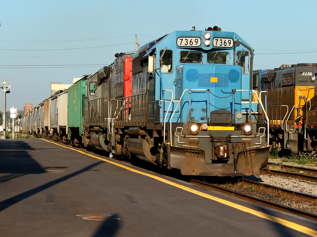 GEXR 432 passes the Kitchener VIA station.