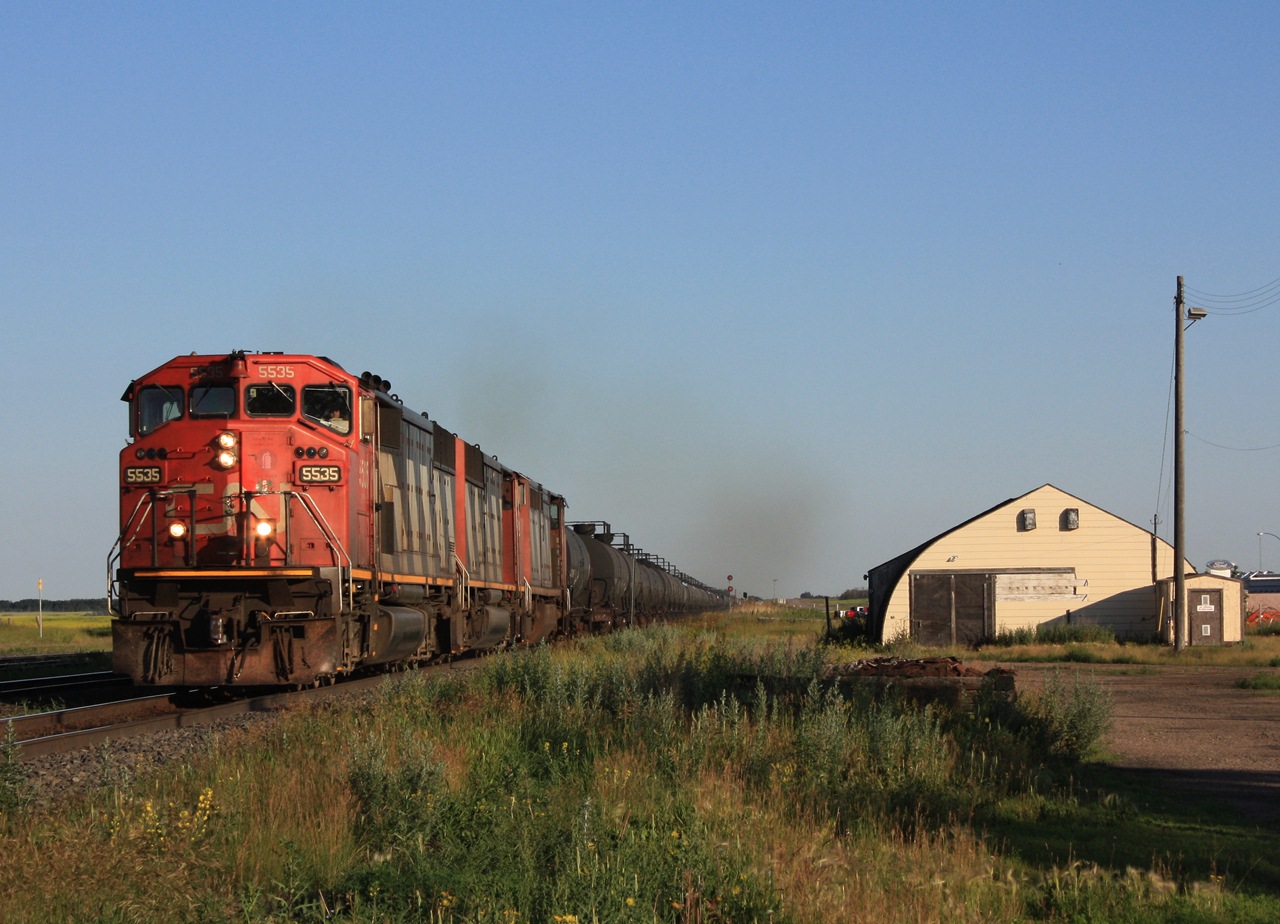 CN 452 with 5535 leading awakens the town of Watrous as it roars through early in the morning as it heads towards Melville.
