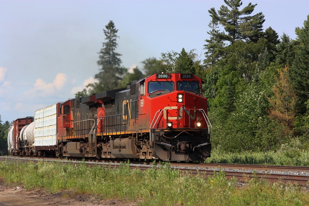 CN M316 with CN 2690 and CN 2510 chug up the hill at Waubamik, before gliding down to Parry Sound.
