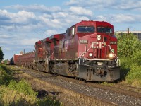 CP 254 heads west through Little Portugal with work in Lambton YD.