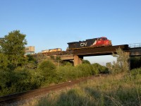 A single-unit CN Q14921 07 cruises westbound over the Mactier Sub.